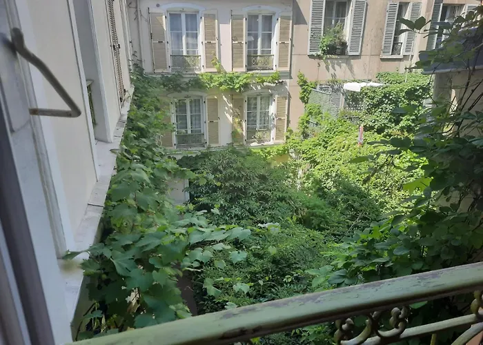 Гостевой дом D'hotes Calmes Sur Jardin Batignolles Париж